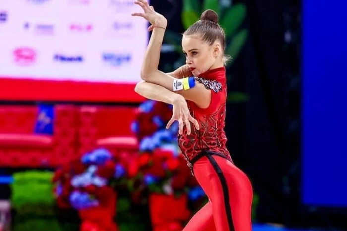 16-year-old Onofriychuk with yellow-blue ribbons