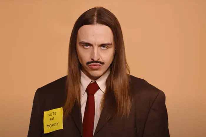 Estonian Eurovision representative in front of video