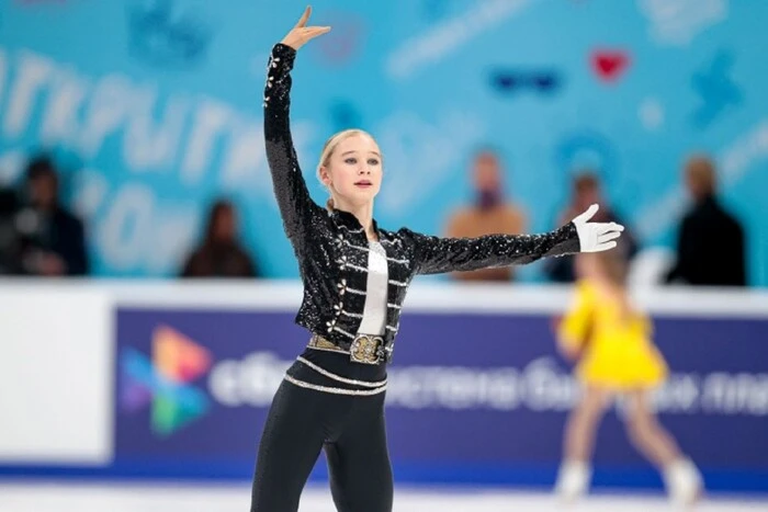 Figure skater practicing a backflip on the ice