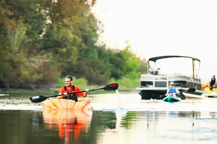 Man rows giant pumpkin boat